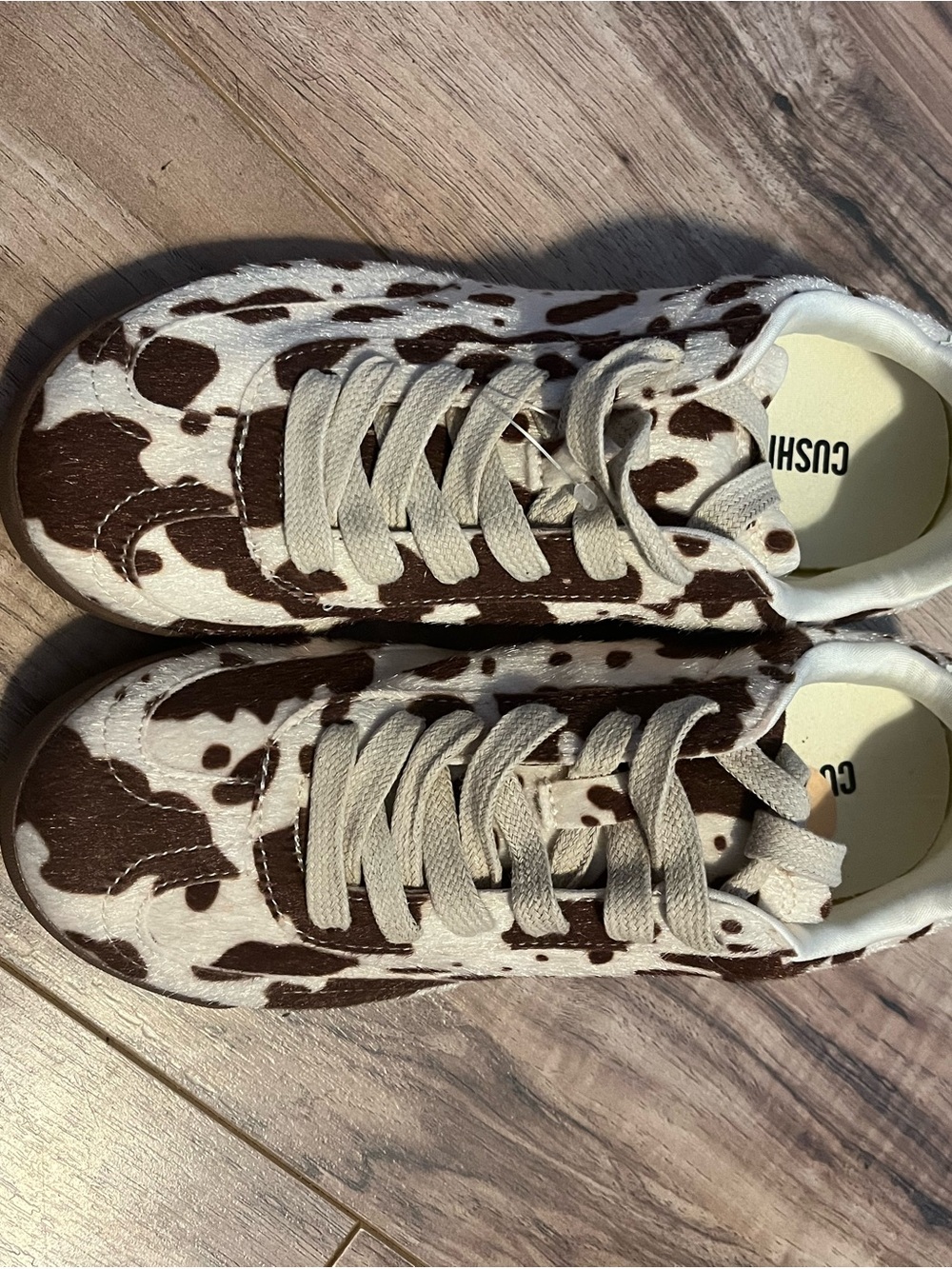 Cow-Print Lace-Up Sneakers in Brown & White